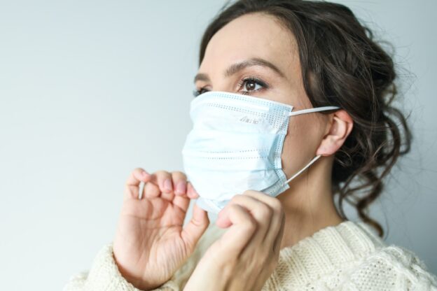 Women in white face mask